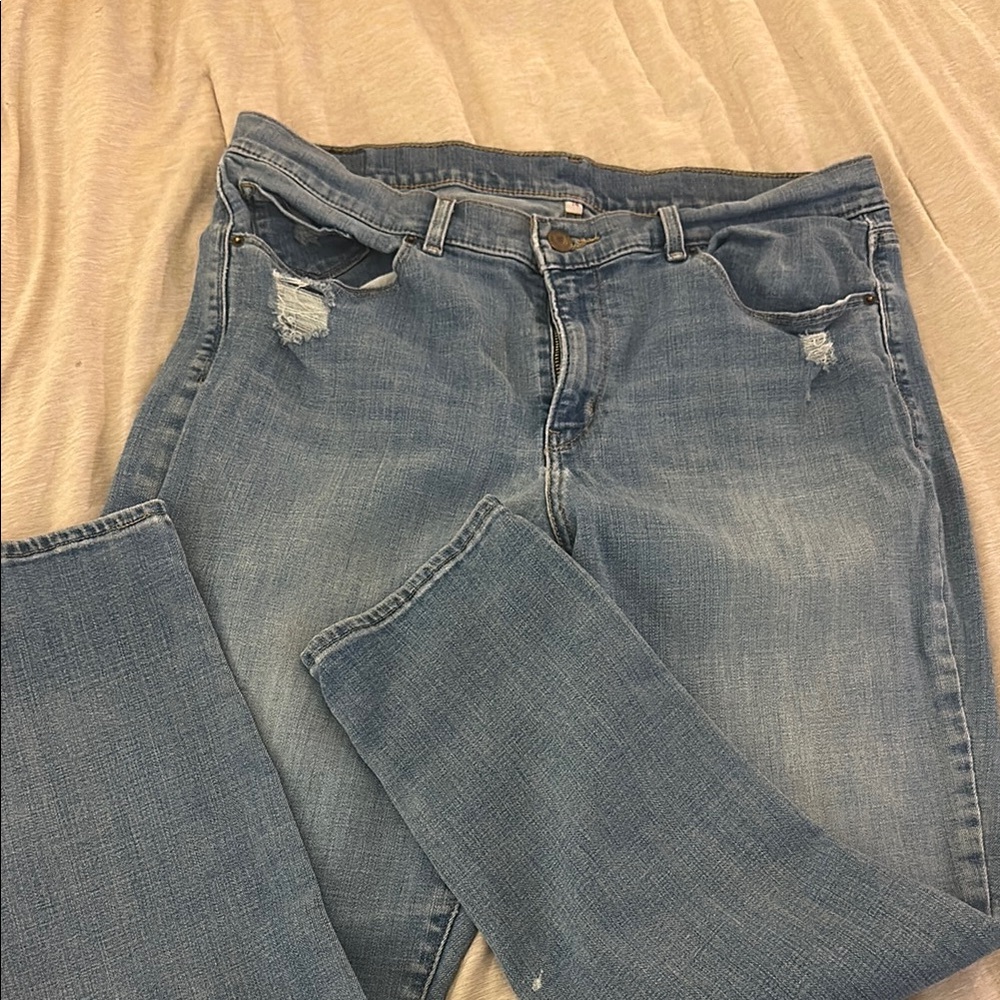 Blue Straight Leg Levi’s with Distressed Details